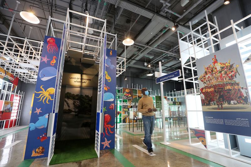 Visitors look around the Nigerian pavilion.