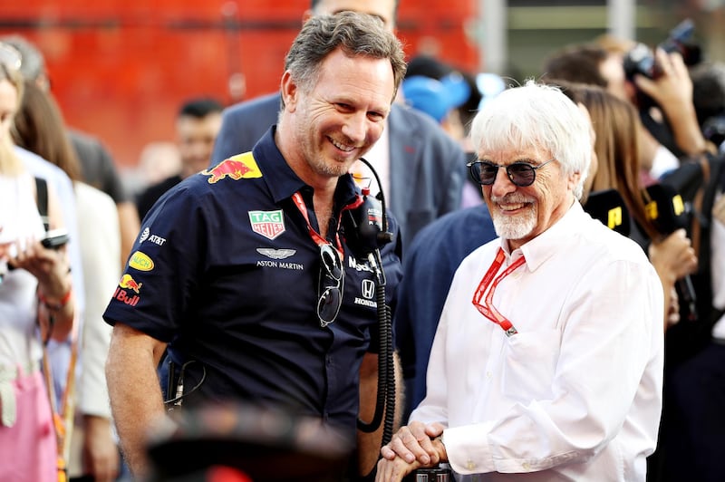 Red Bull Racing team principal Christian Horner talks with Bernie Ecclestone, Chairman Emeritus of the Formula One Group, on the grid before the Abu Dhabi Grand Prix. Getty
