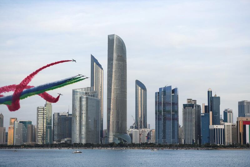 Abu Dhabi, United Arab Emirates - Al Fursan aerobatic demonstration lights up the skyline of Abu Dhabi on December 2, 2018. (Khushnum Bhandari/ The National)
