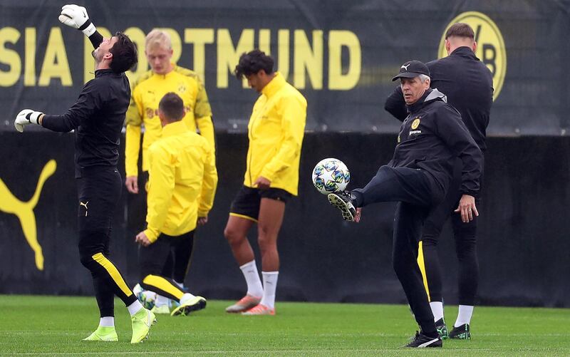 Dortmund's head coach Lucien Favre leads his team's training session. EPA