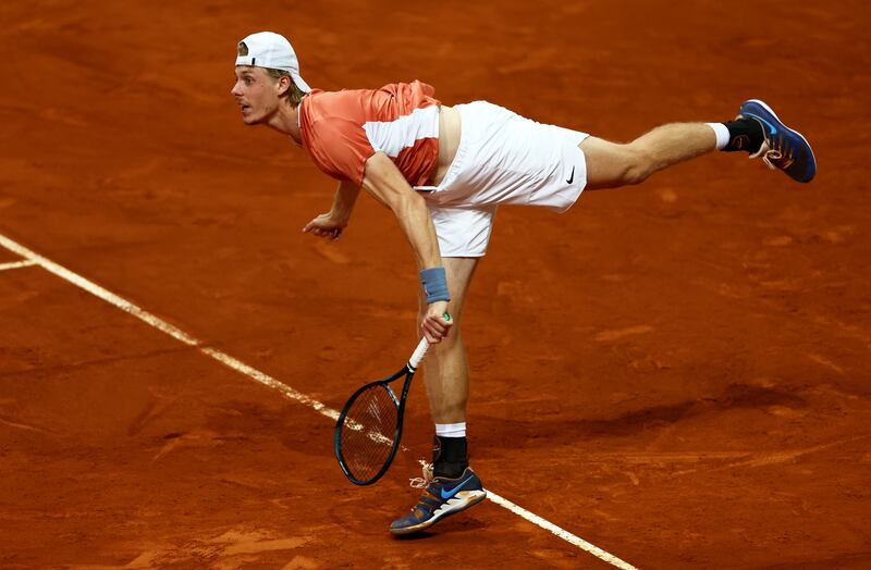 Denis Shapovalov serves against Andy Murray. Getty