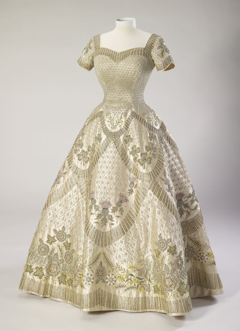 Queen Elizabeth II's coronation dress, designed by Sir Norman Hartnell, is on show as part of the The Queen's Coronation exhibition at Windsor Castle in celebration of her platinum jubilee.