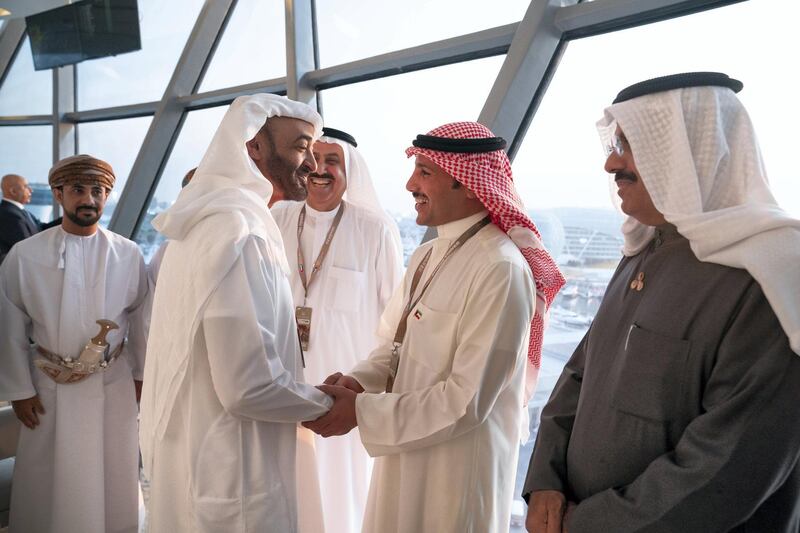 YAS ISLAND, ABU DHABI, UNITED ARAB EMIRATES - December 01, 2019: HH Sheikh Mohamed bin Zayed Al Nahyan, Crown Prince of Abu Dhabi and Deputy Supreme Commander of the UAE Armed Forces (L), greets HE Marzouq Al Ghanim, Speaker of the Kuwait National Assembly (2nd R), at Shams Tower during the Formula 1 2019 Etihad Airways Abu Dhabi Grand Prix at Yas Marina Circuit. Seen with HH Sheikh Ahmad Nawaf Al-Ahmad Al-Sabah, Governor of Hawally, Kuwait (R) and HE Saqr bin Ghobash Saeed Ghobash, Chairman of the UAE Federal National Council (FNC) (3rd R).

( Hamad Al Kaabi  / Ministry of Presidential Affairs )
---