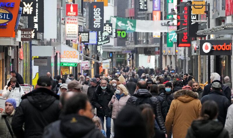 People fill the streets shopping in Cologne. AP