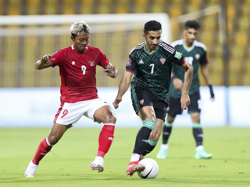 Ali Mabkhout of the UAE battles with Kushedya Hari Yudo of Indonesia during the game between the UAE and Indonesia in the World cup qualifiers at the Zabeel Stadium, Dubai on June 11th, 2021. Chris Whiteoak / The National. 
Reporter: John McAuley for Sport