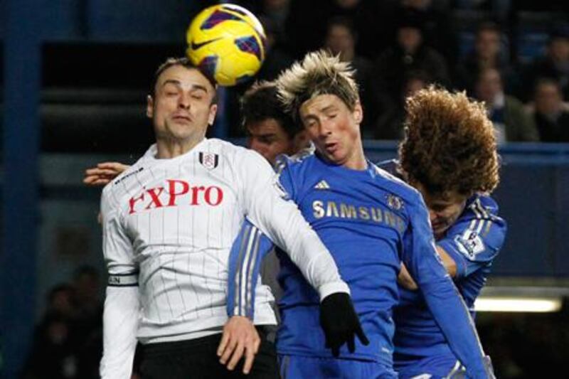 Dimitar Berbatov and Fernando Torrez challenge for the ball during Chelsea's 0-0 draw with Fulham.