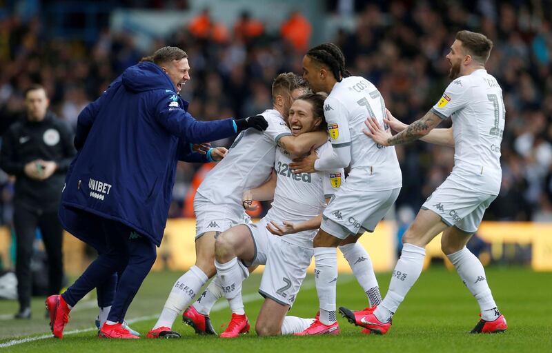 FILE PHOTO: Soccer Football - Championship - Leeds United v Huddersfield Town - Elland Road, Leeds, Britain - March 7, 2020  Leeds Uniteds Luke Ayling celebrates scoring their first goal with teammates   Action Images/Ed Sykes  EDITORIAL USE ONLY. No use with unauthorized audio, video, data, fixture lists, club/league logos or "live" services. Online in-match use limited to 75 images, no video emulation. No use in betting, games or single club/league/player publications.  Please contact your account representative for further details./File Photo