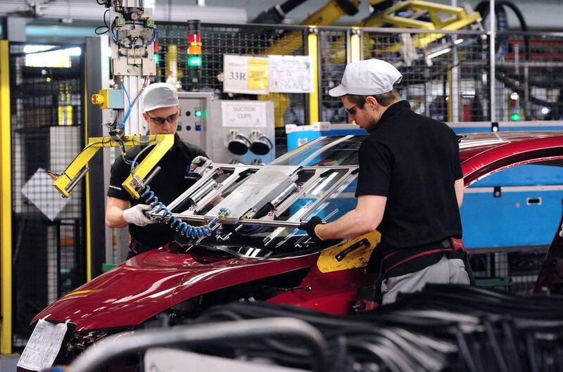 A windscreen is fitted to the Nissan Leaf electric car at the Nissan Plant, Sunderland.