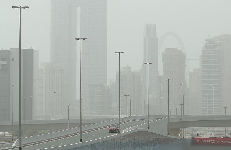 Dust engulfs buildings in Dubai Marina. Pawan Singh / The National