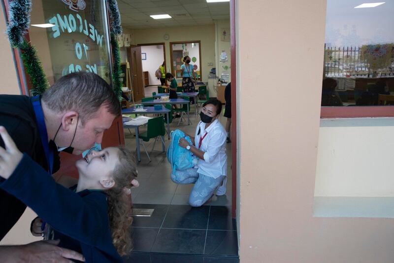 A child is dropped off at Greenfield International School. Antonie Robertson / The National