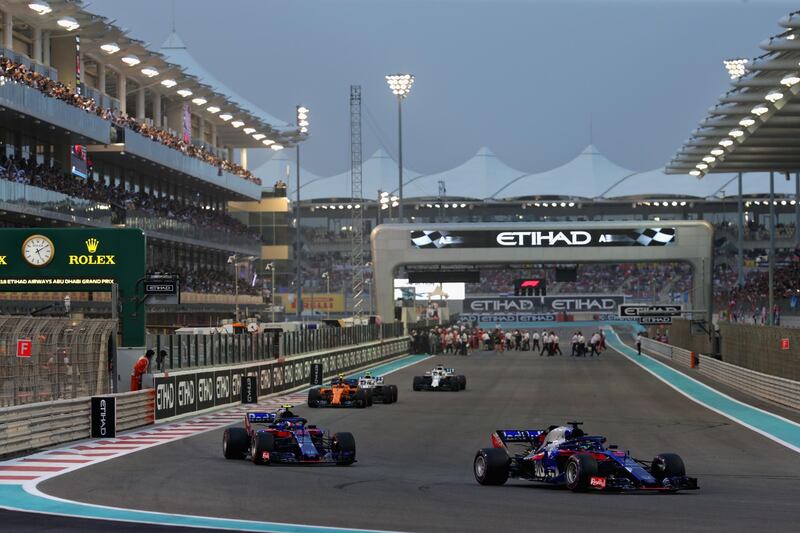 ABU DHABI, UNITED ARAB EMIRATES - NOVEMBER 25: Brendon Hartley of New Zealand driving the (28) Scuderia Toro Rosso STR13 Honda leads Pierre Gasly of France and Scuderia Toro Rosso driving the (10) Scuderia Toro Rosso STR13 Honda on the formation lap before the Abu Dhabi Formula One Grand Prix at Yas Marina Circuit on November 25, 2018 in Abu Dhabi, United Arab Emirates.  (Photo by Peter Fox/Getty Images)