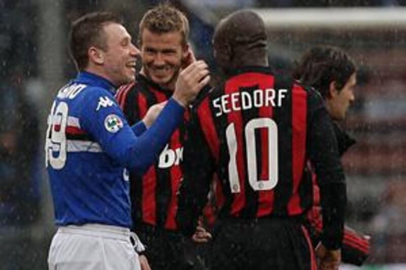 David Beckham, centre, shares a joke with AC Milan teammate Clarence Seedorf and former Real Madrid teammate Antonio Cassano, now of Sampdoria.