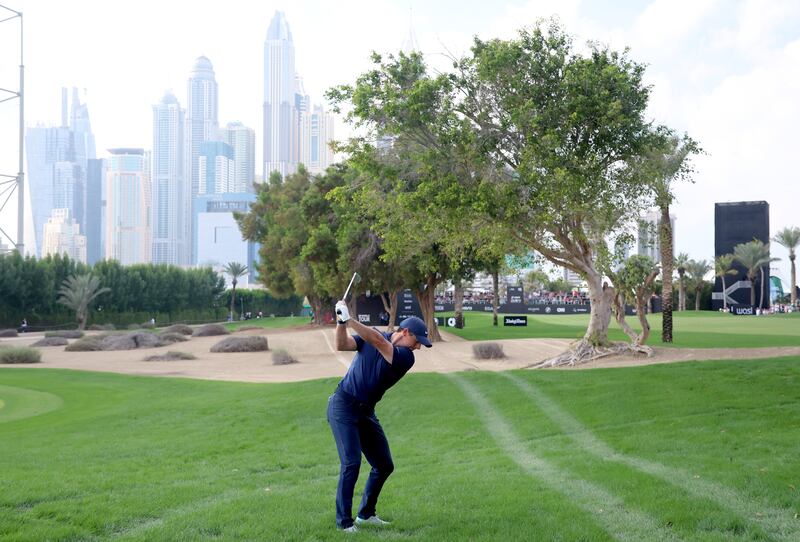 McIlroy plays his second shot on the 15th hole. Getty