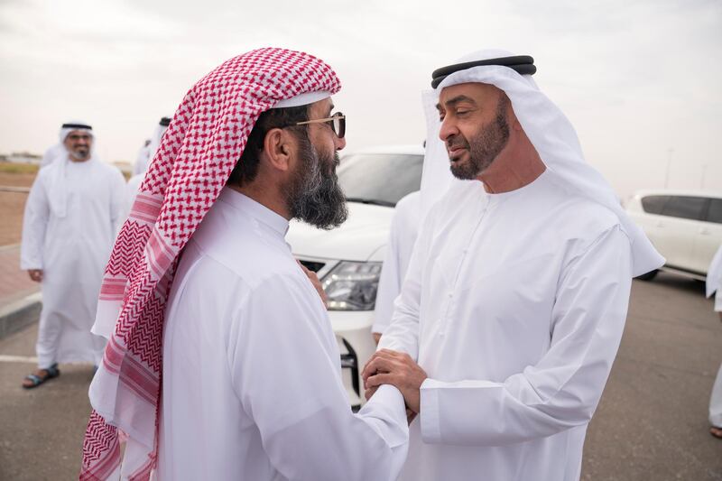 AL AIN, ABU DHABI, UNITED ARAB EMIRATES - September 16, 2019: HH Sheikh Mohamed bin Zayed Al Nahyan, Crown Prince of Abu Dhabi and Deputy Supreme Commander of the UAE Armed Forces (R), offers condolences to the family of martyr Warrant Officer Nasser Mohamed Hamad Al Kaabi.

( Hamad Al Kaabi / Ministry of Presidential Affairs )​
---
