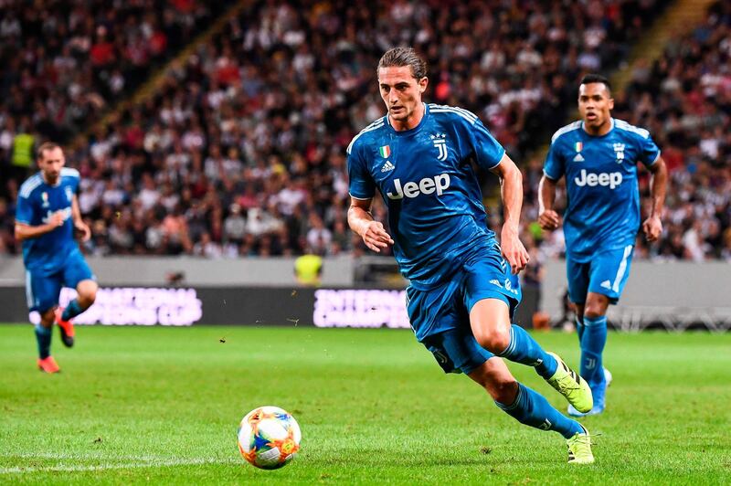 Juventus' midfielder Adrien Rabiot looks to make a break. AFP