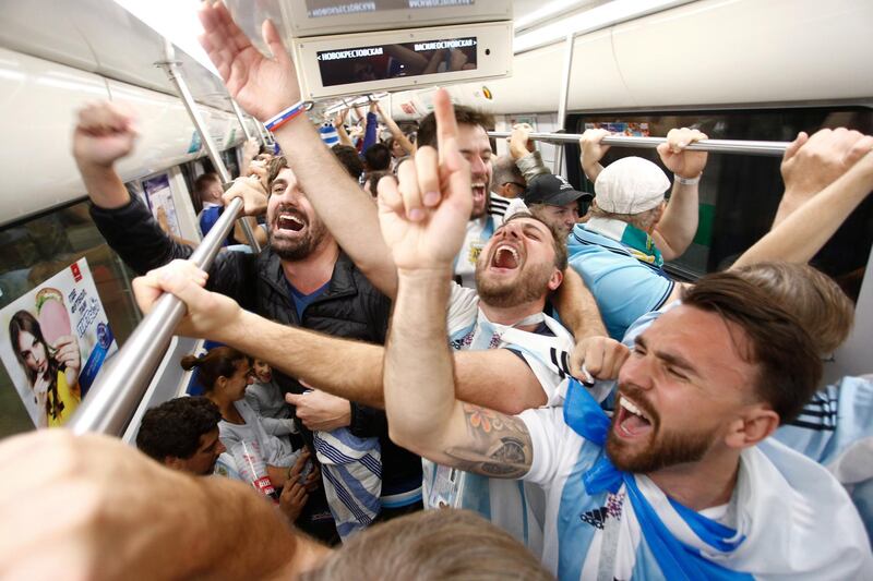 Argentina's fans celebrate after the match in a subway car. Anton Vaganov / Reuters