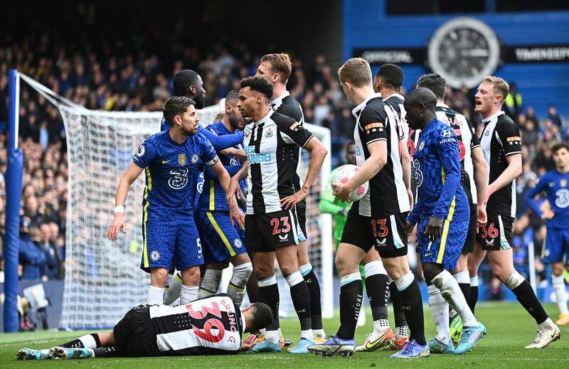 Tempers fray at Stamford Bridge as Newcastle midfielder Bruno Guimaraes lies injured. Getty