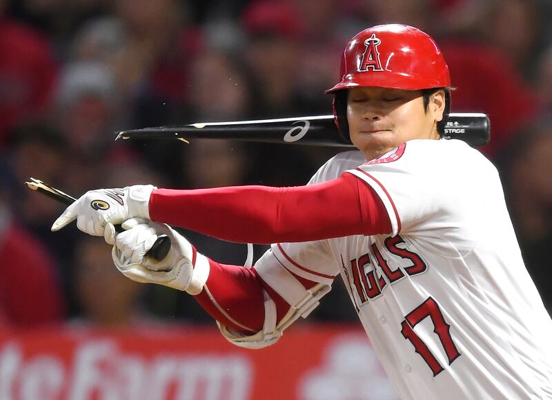 Los Angeles Angels' Shohei Ohtani breaks his bat in the seventh innings against the Oakland Athletics at Angel Stadium in California on September 18. USA TODAY Sports