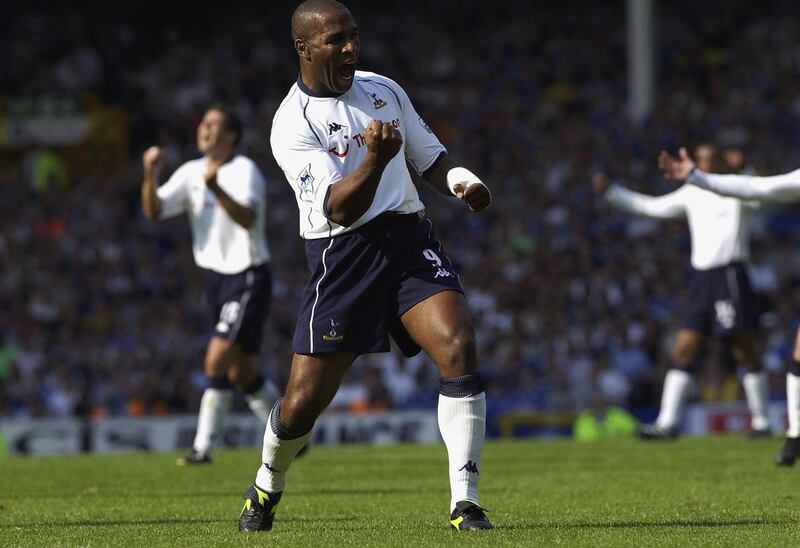 LIVERPOOL - AUGUST 17: Les Ferdinand of Spurs celebrates scoring the second goal during the Everton v Tottenham Hotspur Barclaycard Premiership match played at Goodison Park, Everton, England on August 17, 2002.  (Photo by Clive Brunskill/Getty Images)
