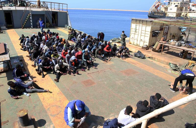 At least 95 migrants were rescued and taken to a naval base in Tripoli, but about 15 died after their boat sank. AFP