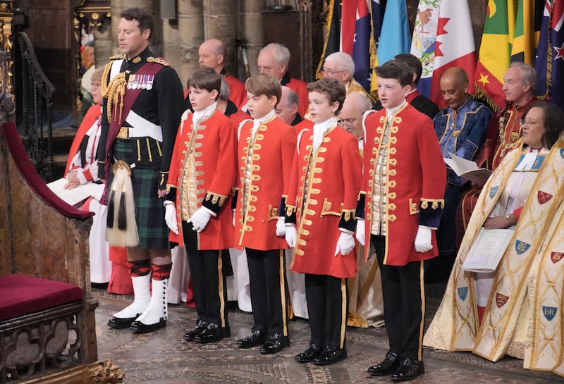 Prince George, centre, at the coronation ceremony. PA