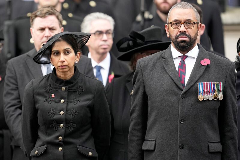 Ms Braverman with Foreign Secretary James Cleverly at the Remembrance Sunday service in London. She had caused a furious backlash with a series of controversial comments. AP