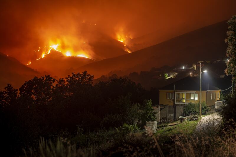 A forest fire burns near Carballeda de Valdeorras, Spain. EPA