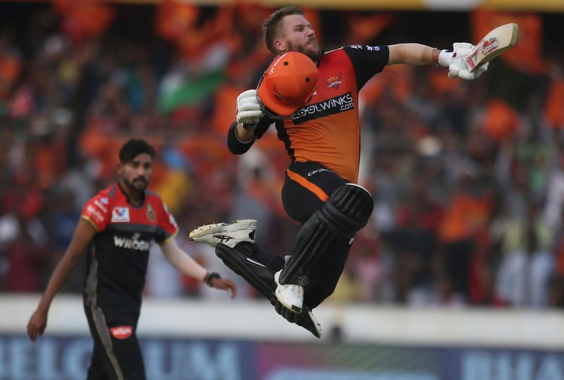 Sunrisers Hyderabad's David Warner celebrates after scoring hundred runs against Royal Challengers Bangalore during the VIVO IPL T20 cricket match in Hyderabad, India, Sunday, March 31, 2019. (AP Photo/ Mahesh Kumar A.)