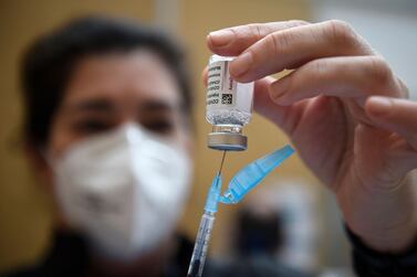 A nurse fills a syringe with the AstraZeneca Covid-19 vaccine during a mass vaccination campaign for people between ages of 50 to 55 in Vigo, northwestern Spain. AFP