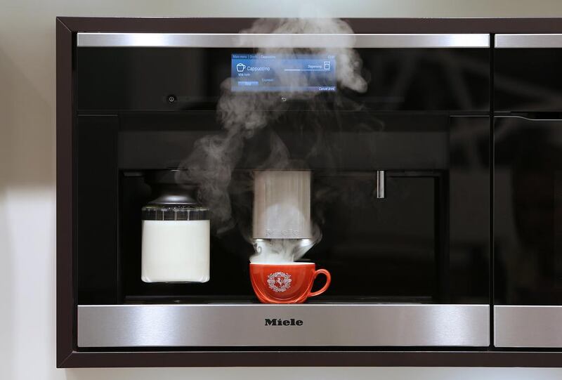 A Miele coffee system prepares a cup of espresso. Miele now offers a stand alone coffee machine with Nespresso embossed on the front. Pawan Singh / The National