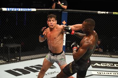 ABU DHABI, UNITED ARAB EMIRATES - SEPTEMBER 27: (L-R) Paulo Costa of Brazil punches Israel Adesanya of Nigeria in their middleweight championship bout during UFC 253 inside Flash Forum on UFC Fight Island on September 27, 2020 in Abu Dhabi, United Arab Emirates. (Photo by Josh Hedges/Zuffa LLC via Getty Images)