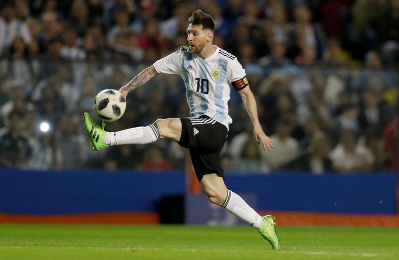 Argentina's Lionel Messi controls the ball. Natacha Pisarenko / AP Photo