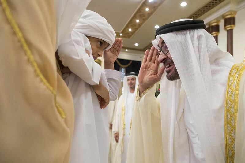 Sheikh Mohammed bin Zayed greets Sheikh Hamdan bin Shakboot bin Nahyan during an Eid Al Fitr reception. Mohamed Al Hammadi / Crown Prince Court - Abu Dhabi