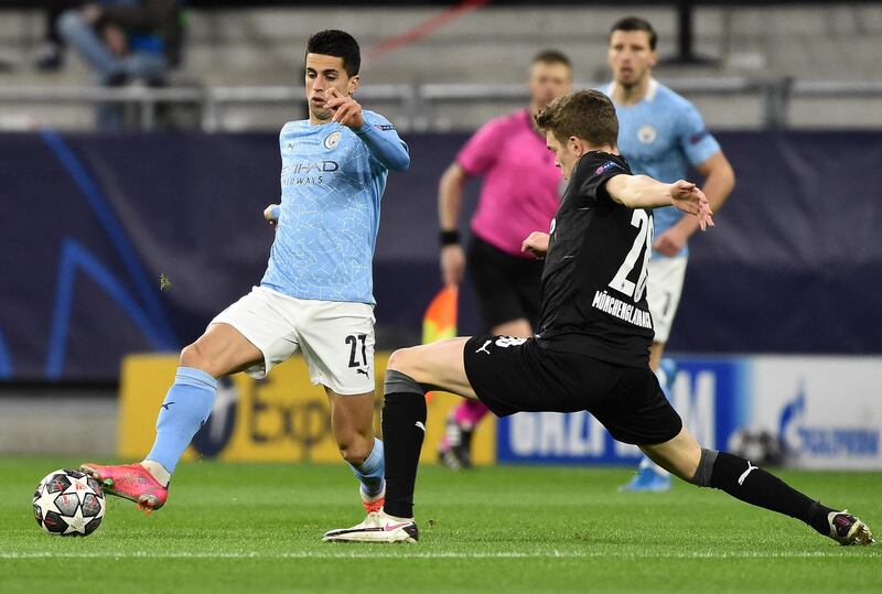 Left-back - Joao Cancelo (Manchester City). In the sort of form where Pep Guardiola can put him anywhere in his formation. Creative, and instinctively tuned about when to roam and when to stick in his position, he shone, as he had in the first leg against Gladbach. AFP