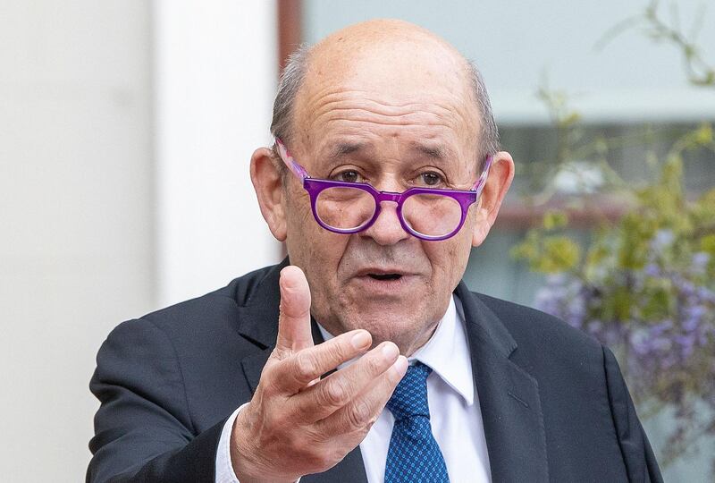 French Minister for Foreign Affairs Jean-Yves Le Drian speaks during a joint press conference with Irish Minister for Foreign Affairs Simon Coveney, at Farmleigh House and Estate in Dublin on May 20, 2021.   / AFP / PAUL FAITH
