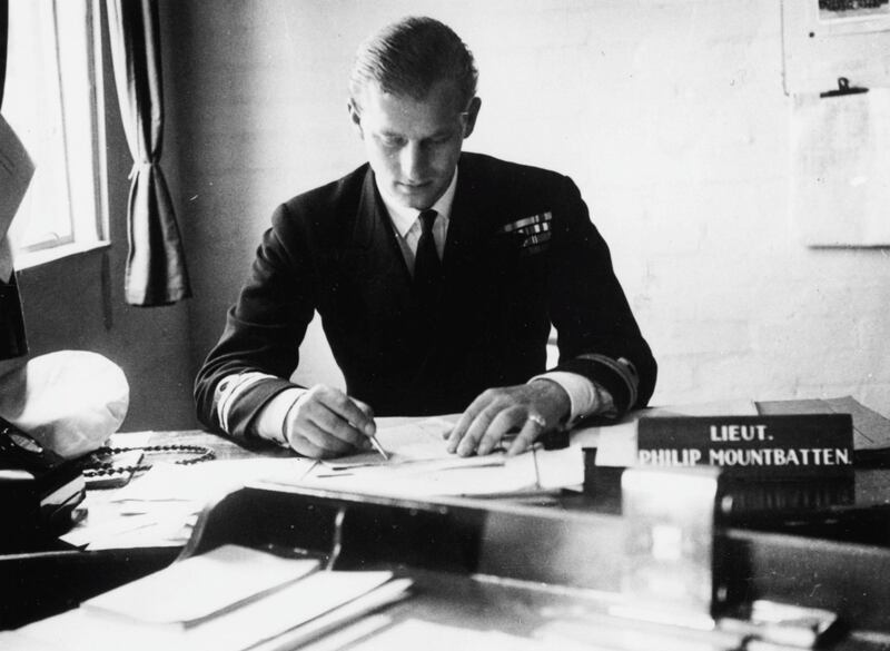 Lieutenant Philip Mountbatten, prior to his marriage to Princess Elizabeth, working at his desk after returning to his Royal Navy duties at the Petty Officers Training Centre in Corsham, Wiltshire, August 1st 1947. (Photo by Douglas Miller/Keystone/Getty Images)