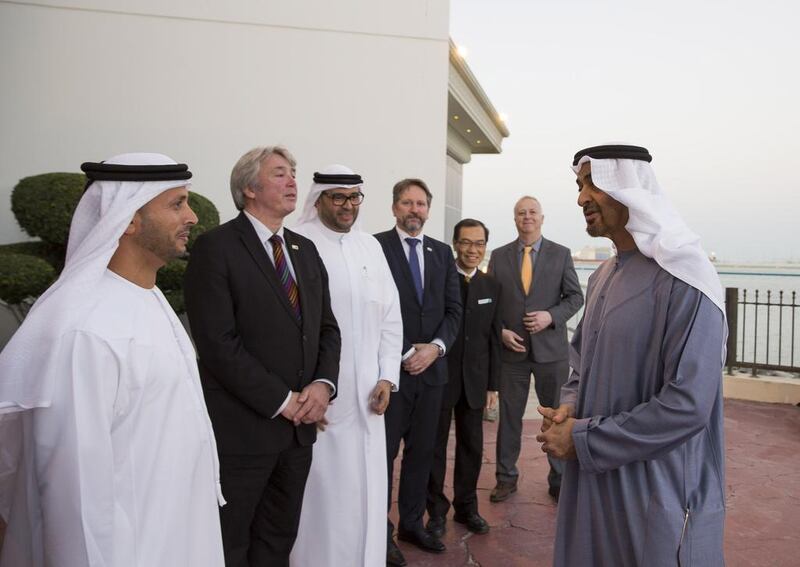 Sheikh Mohammed bin Zayed, Crown Prince of Abu Dhabi and Deputy Supreme Commander of the Armed Forces, speaks with Angelino Alfano, Minister of Foreign Affairs and International Cooperation of Italy (2nd R), Dr Anwar Gargash, Minister of State for Foreign Affairs and Liborio Stellino, Ambassador of Italy to the UAE (L), during a Sea Palace barza. Hamad Al Kaabi / Crown Prince Court — Abu Dhabi