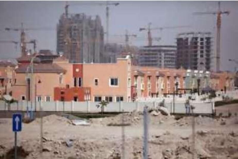 United Arab Emirates - Dubai - June 11, 2010.

NAYLOR: Completed and partially completed villas sit next to stalled projects in Dubai Sports City on Friday, June 11, 2010. Amy Leang/The National