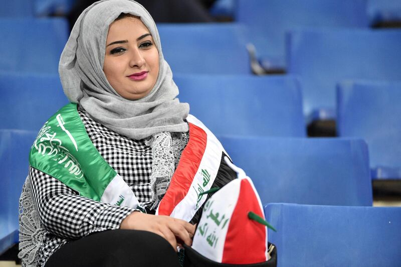 An Iraqi woman at the match in Riyadh watches on. EPA