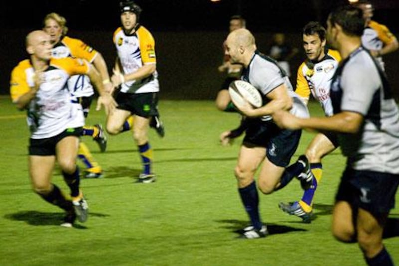 The Dubai Hurricanes, in the yellow-sleeved shirts, could not match the depth of the Jebel Ali Dragons on Friday night.