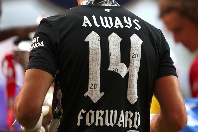 Arsenal's goalkeeper Emiliano Martinez wears an "Always Forward" shirt at the end of the FA Cup final. AP