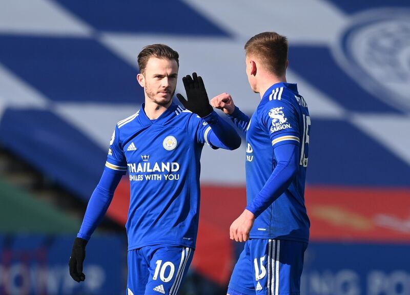 Leicester City's James Maddison celebrates scoring their first goal with Harvey Barnes. Reuters