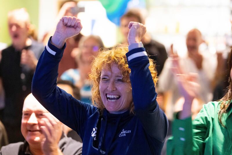 Suzanne Williams, Strength and Conditioning coach for Emma Raducanu aged 8-12, watches the US Open tennis match remotely at the Parklangley Club in Beckenham, England, as she celebrates Raducanu winning. PA