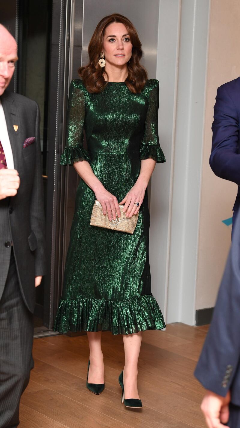 For the visit, the Duchess of Cambridge wore a dress by The Vampire's Wife. Reuters
