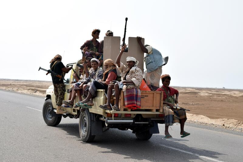 epa07143258 Yemeni government forces take part in military operations on Houthi positions in the port city of Hodeidah, Yemen, 05 November 2018. According to reports, more than 50 Houthi rebels and 17 Yemeni government loyalists were killed in clashes near the strategic port of Hodeidah in western Yemen as Yemeni government forces with the support of the Saudi-led military coalition intensified their attack against the Houthis-controlled port city of Hodeidah which government forces have been seeking to recapture since June.  EPA/STRINGER