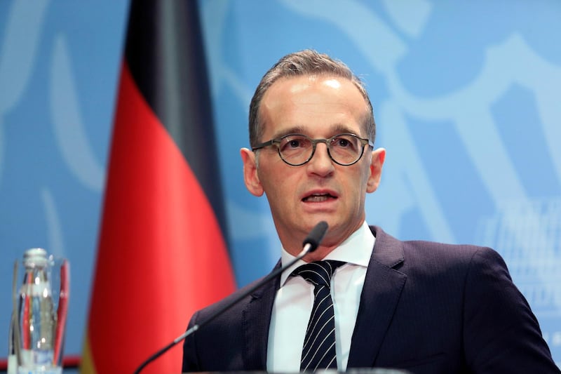 German Foreign Minister Heiko Maas,, speaks during a news conference with his Albanian counterpart Ditmir Bushati in Tirana, Wednesday, Sept. 19, 2018. Germany's foreign minister has called on Albania to work hard with its reforms in order to convince all European Union members to launch the membership negotiations next year. (AP Photo/Hektor Pustina)