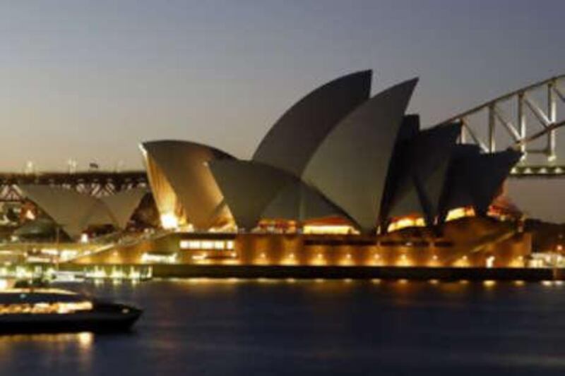 The Sydney Opera House lights are dimmed on it's sails as a mark of respect to mark the death of Jørn Utzon, the creative mind behind the globally known landmark, on Nov 30 2008.