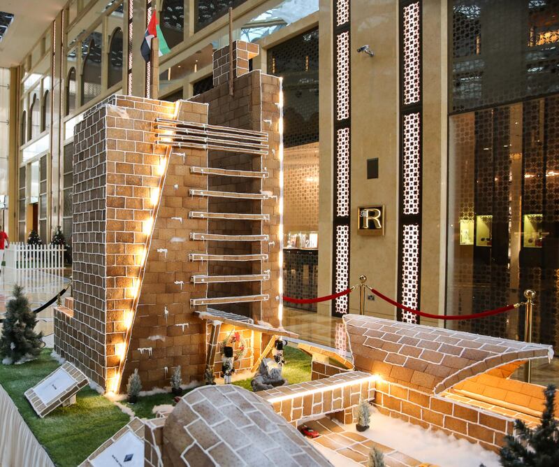 The H Dubai in gingerbread, complete with nutcracker figurines at the base.