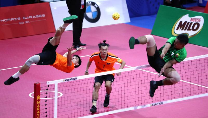 Laos take on Myanmar in the Sepak Takraw competition at the Southeast Asian Games  in Olongapo, Philippines, on Wednesday, December 4. Reuters