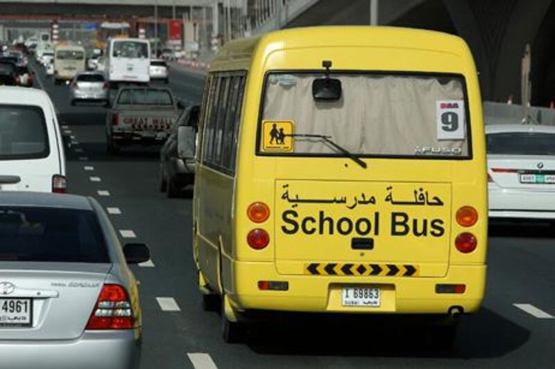 DUBAI, UNITED ARAB EMIRATES Ð Feb 18: School bus on Sheikh Zayed Road in Dubai. (Pawan Singh / The National)